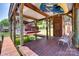 Covered boat slip with boat inside and outdoor seating area to enjoy waterside relaxation at 18311 Rosapenny Rd, Charlotte, NC 28278