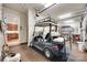 Garage with Golf Cart parked next to an interior room at 18311 Rosapenny Rd, Charlotte, NC 28278