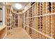 Wine cellar with wood racking for many bottles of wine at 18311 Rosapenny Rd, Charlotte, NC 28278