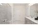 Bathroom featuring a glass-enclosed shower with a bench, double doors, and a modern vanity at 2043 Skyhawk Dr, York, SC 29745