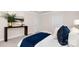 Bedroom showcasing stylish decor, including a dark wood table, elegant artwork, and blue accents at 2043 Skyhawk Dr, York, SC 29745