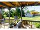 Back porch featuring hanging plants and backyard views at 205 Wrentree Ln, Gastonia, NC 28056