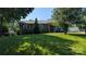 Lovely home with a well-kept front yard featuring mature trees and verdant grass at 205 Wrentree Ln, Gastonia, NC 28056