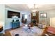Spacious living room with fireplace open to dining area, perfect for entertaining guests at 205 Wrentree Ln, Gastonia, NC 28056