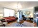 Inviting living room with hardwood floors, ample natural light, and stylish decor at 205 Wrentree Ln, Gastonia, NC 28056
