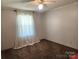 Bright bedroom features neutral carpeting and a window offering natural light at 269 Saddle Rd, Lancaster, SC 29720