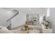 Open concept floor plan of living room with view of kitchen with stainless appliances and island at 2906 Sloan Dr, Charlotte, NC 28208