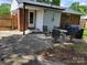 Backyard with patio seating and brick exterior, perfect for outdoor entertainment and leisure at 2939 Lasalle St, Charlotte, NC 28216