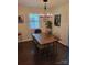 Cozy dining room featuring a wooden table with seating for six, perfect for Gathering meals and entertaining at 2939 Lasalle St, Charlotte, NC 28216