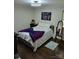 Bedroom featuring hardwood floors, a comfortable bed, and stylish decor for a relaxing retreat at 2939 Lasalle St, Charlotte, NC 28216