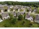 Aerial view of a residential neighborhood with green lawns and mature trees at 301 Garner Dr, Salisbury, NC 28146
