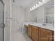 Bathroom featuring a single sink vanity and safety assist bars at 301 Garner Dr, Salisbury, NC 28146