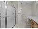 Bathroom showcasing a walk-in shower and safety assist bars at 301 Garner Dr, Salisbury, NC 28146