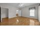 Bright bedroom with hardwood floors, ceiling fan, and attached bath at 301 Garner Dr, Salisbury, NC 28146