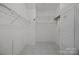 Walk-in closet with shelving and tile floors at 301 Garner Dr, Salisbury, NC 28146