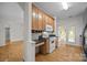 This kitchen offers wood cabinets, modern appliances, and view of outdoor space at 301 Garner Dr, Salisbury, NC 28146