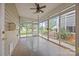 Enclosed sunroom features sliding windows overlooking backyard, letting in light at 301 Garner Dr, Salisbury, NC 28146
