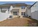 Backyard with patio seating and a privacy fence for outdoor enjoyment at 3050 Des Prez Ave, Fort Mill, SC 29707