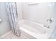 Clean white bathroom features a shower and tub combination with modern fixtures at 3050 Des Prez Ave, Fort Mill, SC 29707