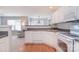 Open kitchen view with modern appliances and an adjacent living area at 3050 Des Prez Ave, Fort Mill, SC 29707