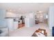Open living space showcasing a kitchen, dining area, and a staircase, creating a harmonious and functional design at 3050 Des Prez Ave, Fort Mill, SC 29707