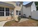 Private patio space features seating, potted plants and a fenced yard at 3050 Des Prez Ave, Fort Mill, SC 29707