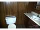 This bathroom shows a toilet and a sink with a white countertop at 3225 Sawmill Rd, Hickory Grove, SC 29717