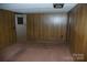 Bedroom featuring paneled walls and neutral carpet at 3225 Sawmill Rd, Hickory Grove, SC 29717