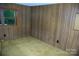 The bedroom features paneled walls and a window at 3225 Sawmill Rd, Hickory Grove, SC 29717