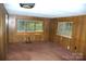 Bedroom features paneled walls and neutral carpet at 3225 Sawmill Rd, Hickory Grove, SC 29717
