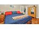 Cozy bedroom offers neutral tones, a bright sunny window and original hardwood floors at 3430 Rea Rd, Charlotte, NC 28226