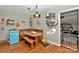 Charming kitchen nook with cozy seating, unique light fixtures, and vintage-inspired decor at 3430 Rea Rd, Charlotte, NC 28226