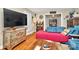 Inviting living room featuring a colorful chest and an entry to another cozy room at 3430 Rea Rd, Charlotte, NC 28226