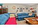 Comfortable living room featuring stylish decor, plush seating, and warm ambiance for relaxation and entertainment at 3430 Rea Rd, Charlotte, NC 28226
