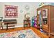 Charming living space with hardwood floors, unique wall art, and a colorful rug at 3430 Rea Rd, Charlotte, NC 28226