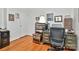 Efficient home office featuring hardwood floors, natural light and ample storage at 3430 Rea Rd, Charlotte, NC 28226