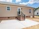 Backyard patio with stairs and modern siding at 355 Northbrook Iii School Rd # 10, Vale, NC 28164