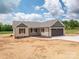 Charming single-story home with a two-car garage, lovely siding, and a well-manicured lawn at 355 Northbrook Iii School Rd # 10, Vale, NC 28164