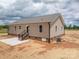 Exterior view of home with a patio and landscaped yard at 355 Northbrook Iii School Rd # 10, Vale, NC 28164