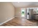 Bright kitchen area featuring stainless steel appliances, white cabinets, and backyard access at 355 Northbrook Iii School Rd # 10, Vale, NC 28164