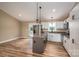 Spacious kitchen with white cabinets, stainless steel appliances, and access to the backyard at 355 Northbrook Iii School Rd # 10, Vale, NC 28164