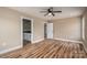 Comfortable main bedroom showcasing wood-look flooring and an attached bathroom with double vanity at 355 Northbrook Iii School Rd # 10, Vale, NC 28164