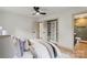 Bedroom featuring an organized walk-in closet and an attached bathroom at 3937 Tamerlane Dr, Charlotte, NC 28205