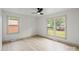 Bright bedroom features two large windows and wood floors at 3937 Tamerlane Dr, Charlotte, NC 28205