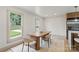 Bright dining area with a modern table, chairs, and recessed lighting at 3937 Tamerlane Dr, Charlotte, NC 28205