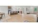 Bright kitchen with a center island, stainless steel appliances, and hardwood floors at 3937 Tamerlane Dr, Charlotte, NC 28205