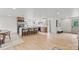 Open-concept kitchen featuring an island with seating, stainless steel appliances, and modern finishes at 3937 Tamerlane Dr, Charlotte, NC 28205