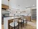 Bright kitchen with stainless steel appliances, an island with seating, and sleek countertops at 3937 Tamerlane Dr, Charlotte, NC 28205