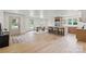 Open-concept kitchen with a large island, stainless steel appliances, and modern finishes at 3937 Tamerlane Dr, Charlotte, NC 28205