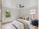 Bright main bedroom with hardwood floors and ceiling fan at 3937 Tamerlane Dr, Charlotte, NC 28205
